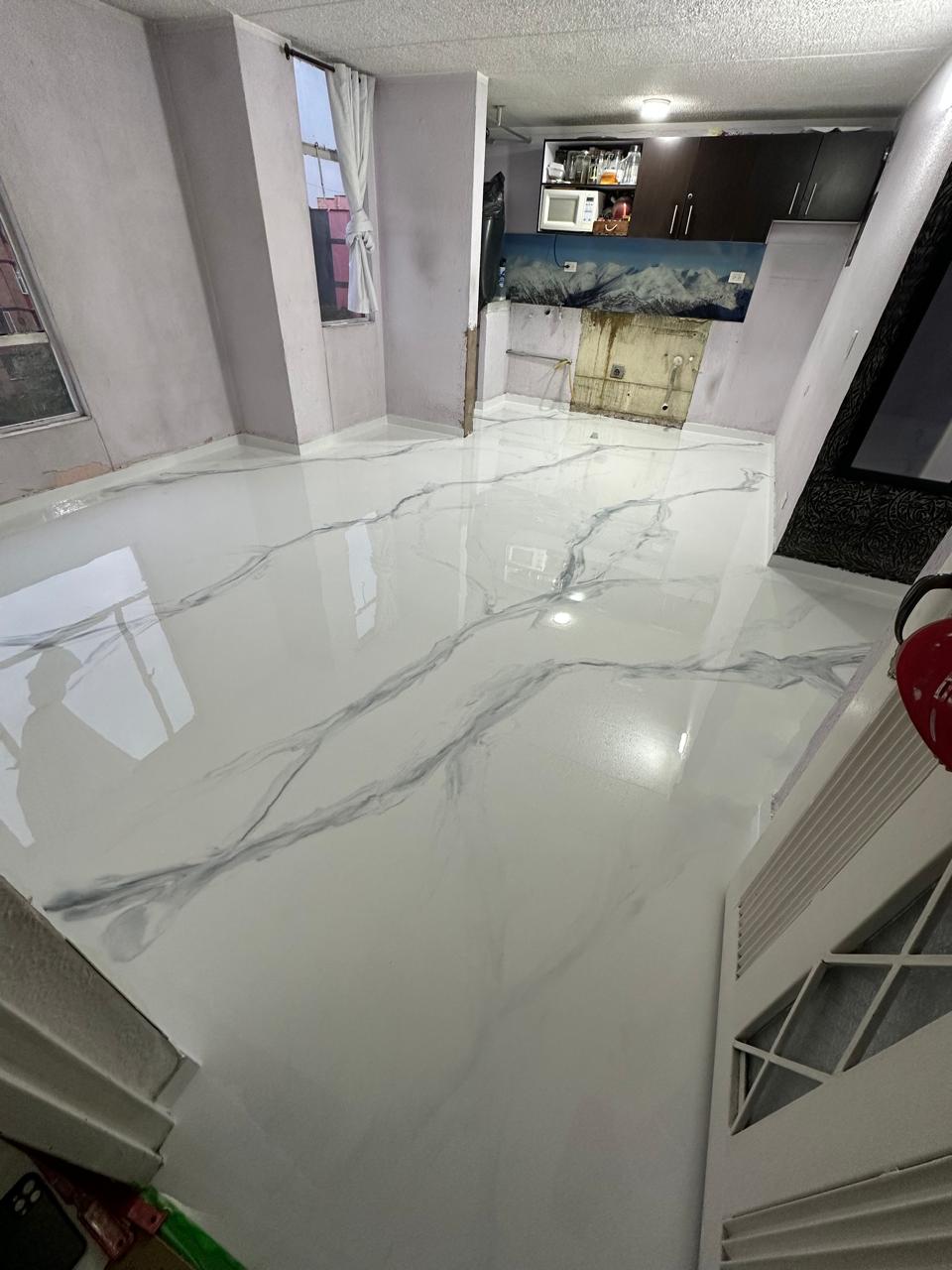 Aplicación de resina epoxica piso residencial